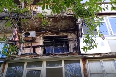 В Крыму полицейский в отпуске вынес из огня на руках пенсионера